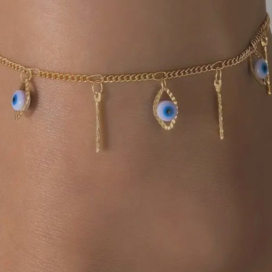 Elegant gold color accessory with evil eye beads